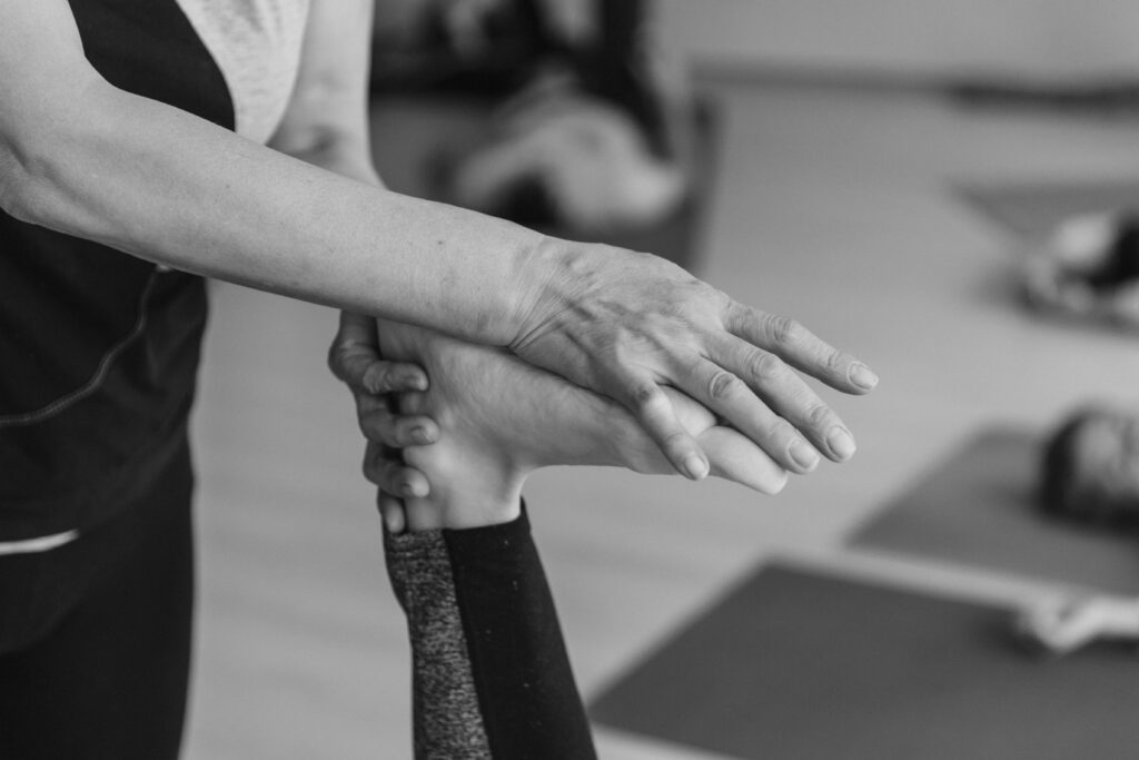 Nahaufnahme Yoga Gruppe, Dehnung Fuß
